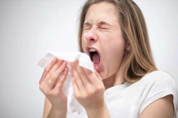 Sneezing Woman with Allergies