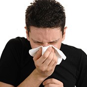 Man Sneezing