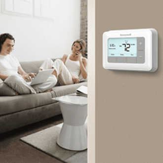 https://s3-assets.sylvane.com/media/images/products/honeywell-rth7560E-7-day-programmable-thermostat-lifestyle-small.png