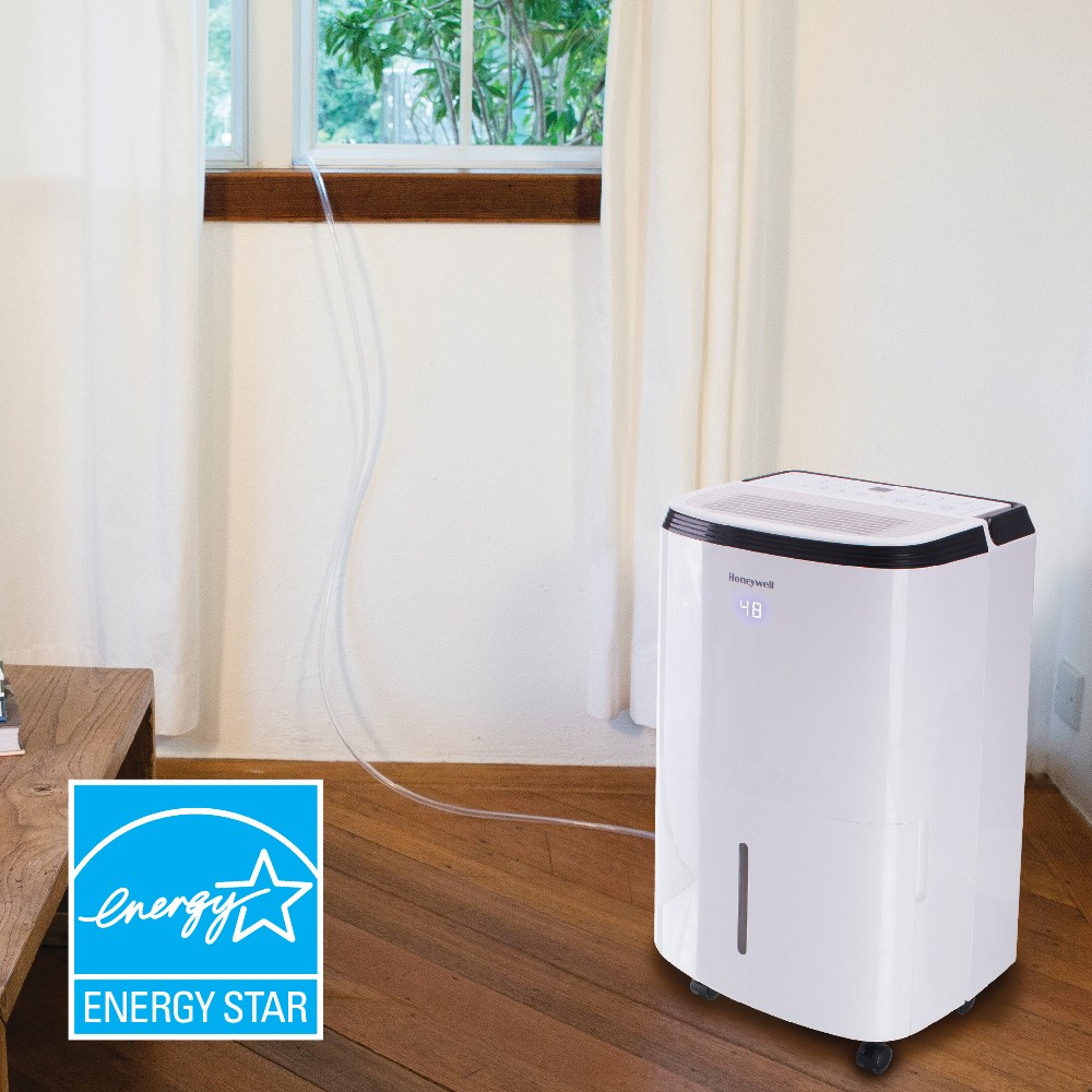 https://s3-assets.sylvane.com/media/images/products/honeywell-tp70pwkn-70-pint-energy-star-dehumidifier-pump-lifestyle-2.jpg